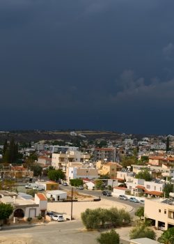 A view of a city under a cloudy sky