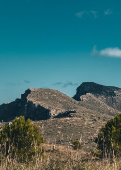A view of a mountain range from a distance