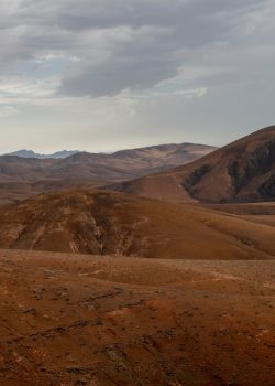 A view of a mountain range from a distance