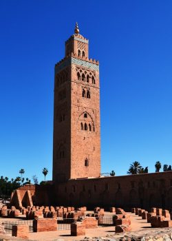 a tall tower with a clock on the top of it