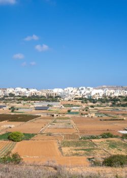 a view of a city from a hill