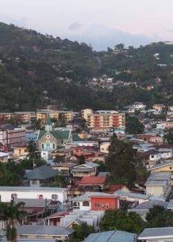 a view of a city with a mountain in the background