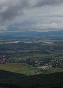 a view of a valley and a town from a high point of view