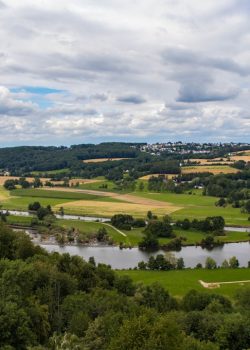green grass field under blue sky during daytime