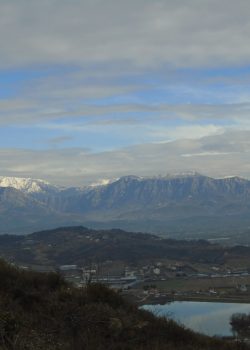 mountain range under clear blue sky